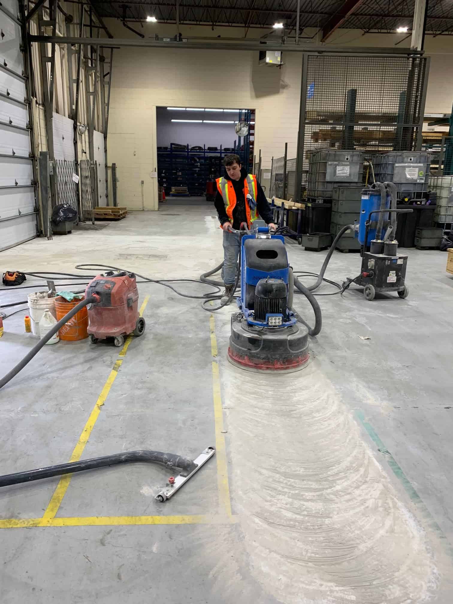 The Complete Guide to Concrete Grinding: Everything You Need to Know Concrete grinding is an essential process in construction and renovation projects that transforms rough, uneven, or damaged concrete surfaces into smooth, polished finishes. Whether you're dealing with a new concrete pour that needs leveling or an old surface requiring restoration, understanding the fundamentals of concrete grinding can help you achieve professional results. What is Concrete Grinding? Concrete grinding is a mechanical process that uses specialized equipment to remove surface imperfections, level uneven areas, and create smooth finishes on concrete floors, walls, and other surfaces. This technique employs diamond-embedded grinding wheels or discs that gradually wear away the concrete surface to achieve the desired texture and appearance. The process is commonly used in: Industrial facilities Retail spaces Warehouses Residential garages Commercial buildings Decorative concrete applications Understanding the Concrete Grinding Process The concrete grinding process involves several systematic steps that ensure optimal results and surface quality. Here's a detailed breakdown of how professionals approach this specialized technique: 1. Surface Assessment and Preparation Before beginning any grinding work, contractors thoroughly evaluate the concrete surface to: Identify high and low spots Check for cracks, holes, or structural damage Determine the appropriate grinding method Select the correct diamond tooling 2. Equipment Setup and Safety Measures Professional concrete grinding requires specialized machinery and safety protocols: Grinders: Walk-behind units, ride-on machines, or handheld grinders Diamond tooling: Various grit levels for different stages Dust collection systems: To maintain air quality and visibility Safety equipment: Protective gear for operators 3. Initial Grinding Phase The concrete grinding process typically begins with coarse-grit diamonds to: Remove surface irregularities Level uneven areas Eliminate coating residues or adhesives Create the initial smooth surface 4. Progressive Refinement Subsequent passes use increasingly finer diamond grits to: Smooth out scratches from previous steps Achieve the desired surface texture Prepare for polishing (if required) Create uniform appearance across the entire surface Types of Concrete Grinding Applications Surface Leveling One of the most common applications involves correcting uneven concrete surfaces caused by: Settlement issues Poor initial installation Wear patterns from heavy traffic Expansion joint irregularities Coating Removal Concrete grinding effectively removes: Old paint and epoxy coatings Adhesive residues Stains and discoloration Surface contaminants Decorative Preparation For decorative concrete projects, grinding prepares surfaces for: Polished concrete finishes Staining applications Overlay installations Texture creation Benefits of Professional Concrete Grinding Enhanced Durability Properly ground concrete surfaces offer: Improved resistance to wear and tear Better adhesion for new coatings Reduced maintenance requirements Extended surface lifespan Aesthetic Improvements The concrete grinding process delivers: Uniform surface appearance Elimination of unsightly imperfections Preparation for decorative treatments Professional-quality finishes Cost-Effectiveness Compared to complete concrete replacement, grinding provides: Significant cost savings Minimal downtime Reduced waste disposal Faster project completion Equipment and Tools Required Primary Grinding Equipment Walk-behind grinders: Ideal for medium-sized areas Ride-on grinders: Efficient for large commercial spaces Handheld grinders: Perfect for edges and detailed work Planetary grinders: Excellent for aggressive material removal Diamond Tooling Options Metal-bonded diamonds: For hard concrete surfaces Resin-bonded diamonds: For softer concrete and fine finishing Hybrid bonds: Versatile options for various concrete types Support Equipment Dust collection systems: Essential for clean operation Water supply systems: For wet grinding applications Edge grinders: For perimeter and detail work Safety Considerations and Best Practices Personal Protective Equipment Essential safety gear includes: Respiratory protection against silica dust Eye and hearing protection Non-slip safety footwear High-visibility clothing Environmental Controls Proper dust management through: HEPA-filtered vacuum systems Wet grinding techniques when appropriate Containment barriers Regular air quality monitoring Operator Training Successful concrete grinding requires: Understanding of equipment operation Knowledge of diamond tool selection Awareness of safety protocols Experience with different concrete types Common Challenges and Solutions Uneven Grinding Results Problem: Inconsistent surface texture or appearance Solutions: Maintain consistent machine speed and pressure Use proper diamond tool selection Ensure adequate operator training Regular equipment maintenance Excessive Dust Generation Problem: Poor visibility and air quality concerns Solutions: Implement effective dust collection systems Consider wet grinding methods Use proper containment measures Regular filter maintenance Diamond Tool Wear Problem: Premature tool degradation Solutions: Match tool hardness to concrete type Maintain proper grinding parameters Regular tool inspection and rotation Quality tool selection Maintenance and Care Equipment Maintenance Regular maintenance ensures optimal performance: Daily cleaning and inspection Proper storage procedures Scheduled component replacement Professional servicing when needed Surface Care Post-Grinding Maintaining ground concrete surfaces involves: Regular cleaning protocols Appropriate sealing when necessary Prompt repair of any damage Periodic re-grinding if required Conclusion The concrete grinding process represents a sophisticated approach to surface preparation and restoration that delivers exceptional results when performed correctly. By understanding the fundamentals of equipment selection, proper technique, and safety protocols, contractors and property owners can achieve professional-quality concrete surfaces that enhance both functionality and appearance. Whether you're preparing surfaces for new coatings, creating decorative finishes, or simply leveling uneven concrete, investing in proper concrete grinding techniques will provide long-lasting, cost-effective solutions for your project needs. Remember that while concrete grinding can be performed as a DIY project for small areas, larger or more complex applications typically benefit from professional expertise to ensure optimal results and safety compliance.